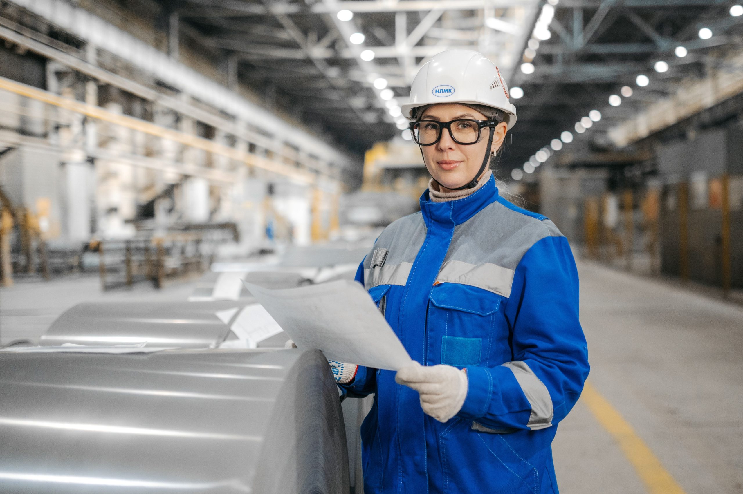 Quality engineer reviewing audit documentation in an industrial plant in South Africa